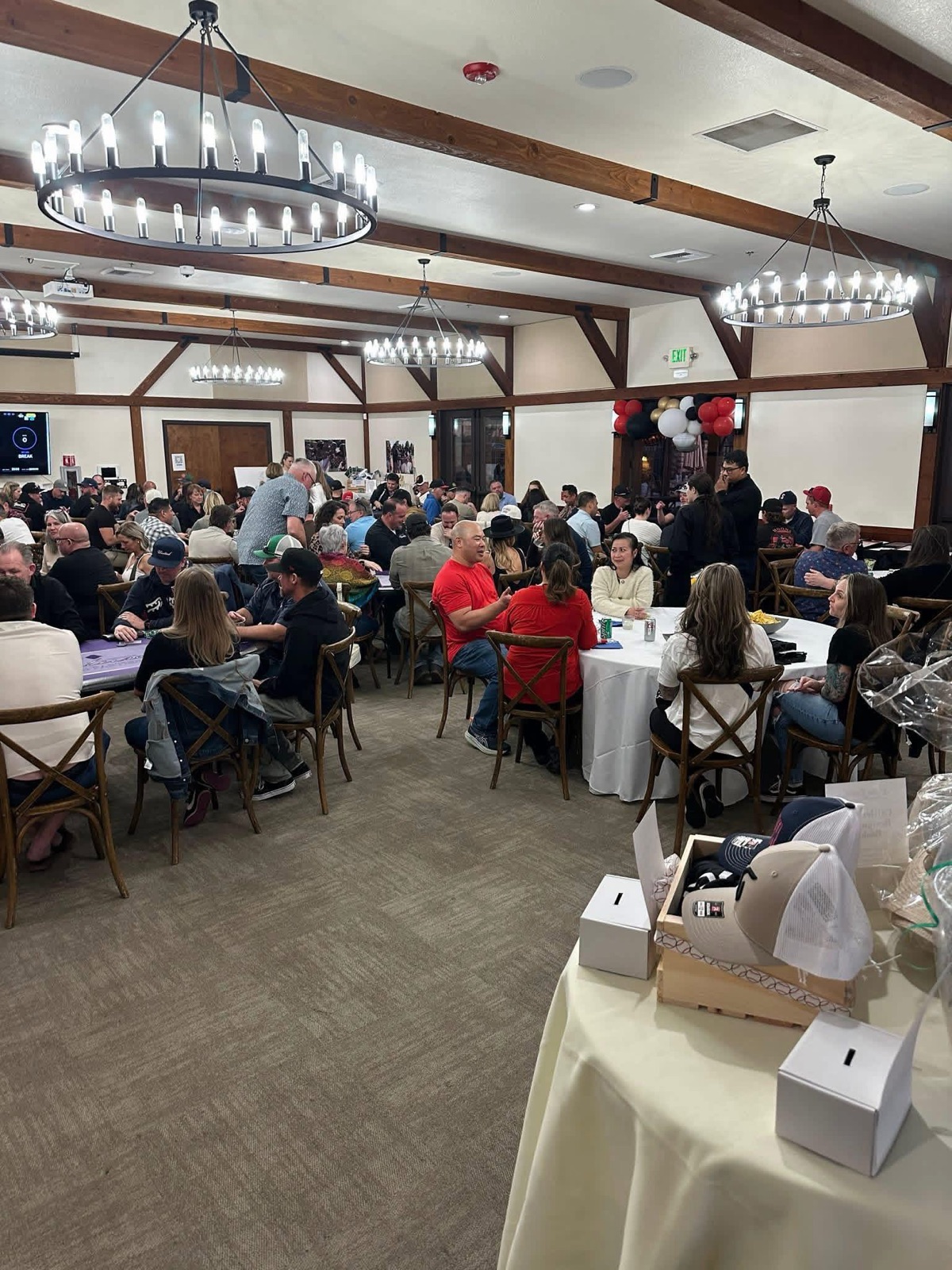 A packed indoor fundraiser night supporting the team